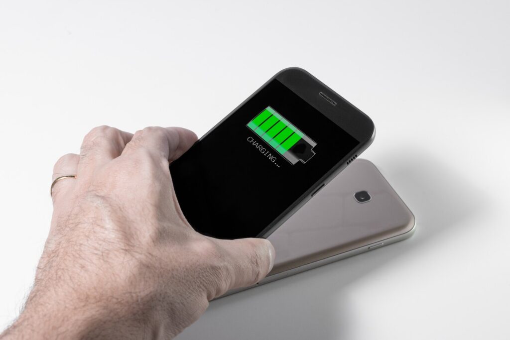 Smartphone being charged by another device via wireless charging 264404 68
